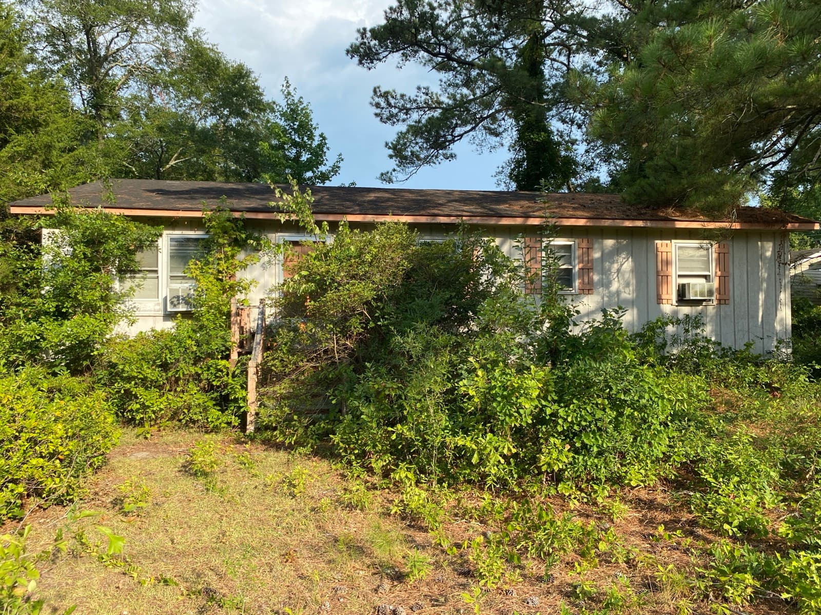 Distressed NC home with open code violations bought as-is by Atlantis Homebuyers, Neighborhood Improvement Services file transferred at closing